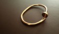 /products/brazalete-de-acero-dorado-tipo-clou-de-cartier/